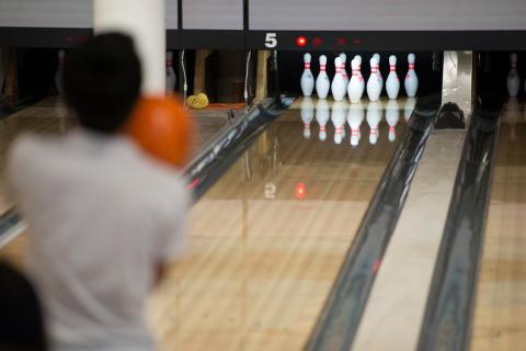 Person setting up to bowl